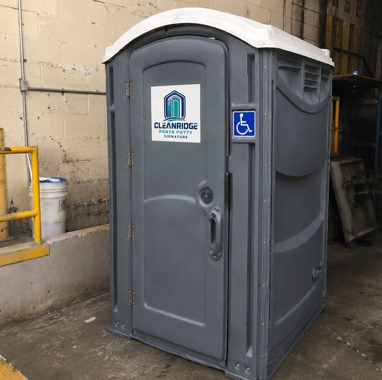 Wheelchair accessible Cleanridge portable toilet with grab bars and ground-level entry